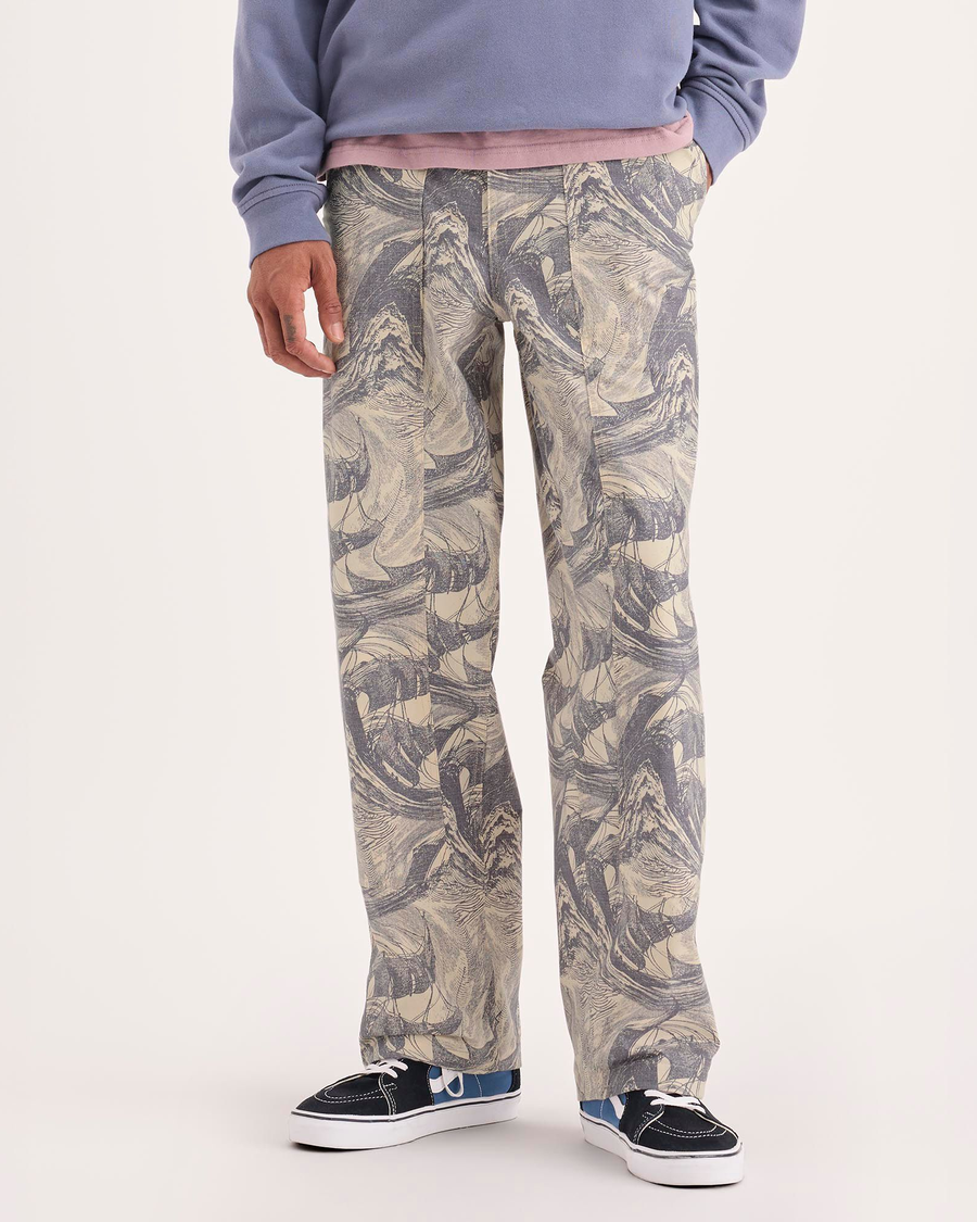 Front view of model wearing Ichabod Buttercream Eighty-Six Utility Pants, Loose Fit.