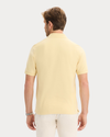 Back view of model wearing Italian Straw Original Polo, Slim Fit.