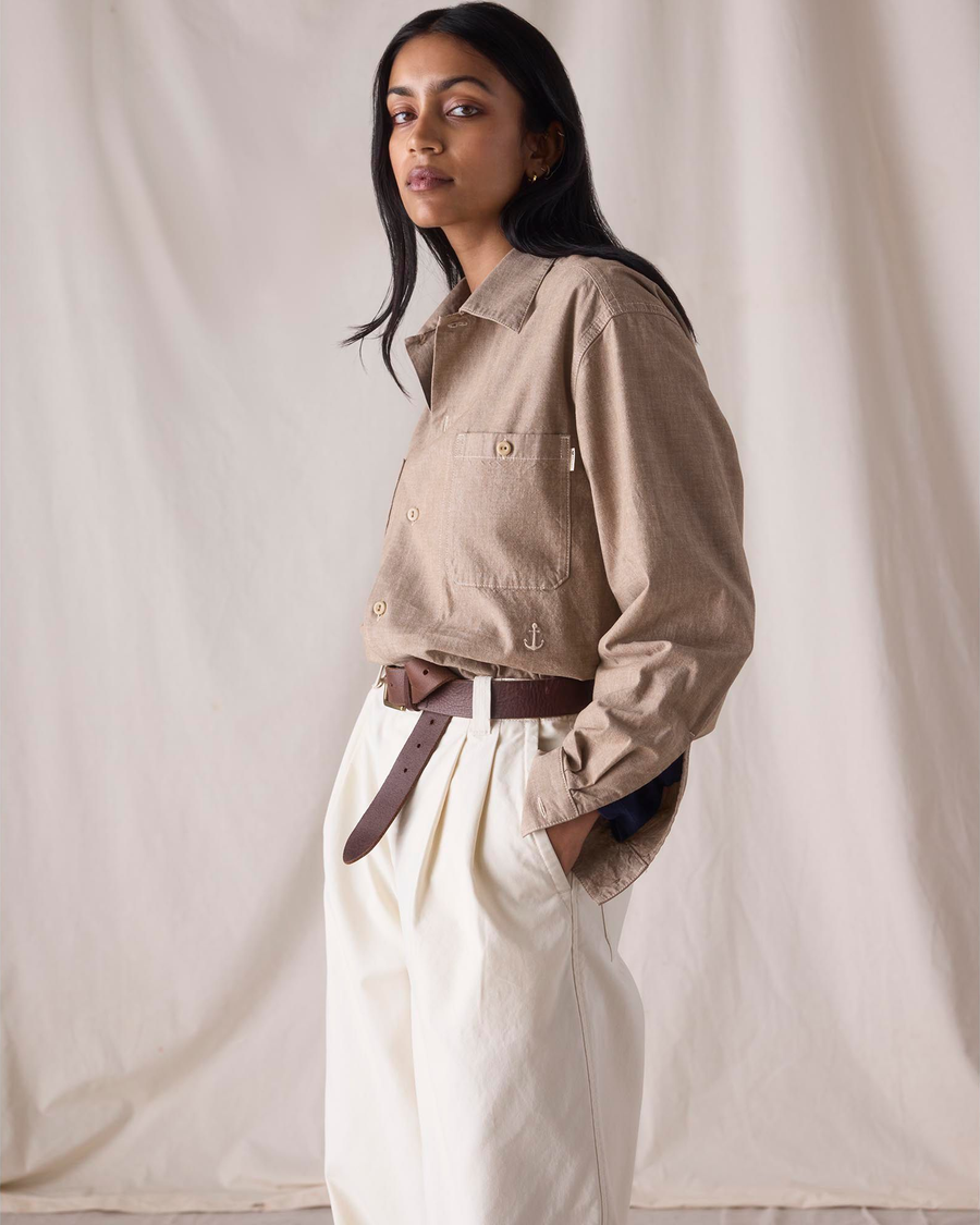 View of model wearing Khaki Chambray Dockers® x Transnomadica Dock Shirt.
