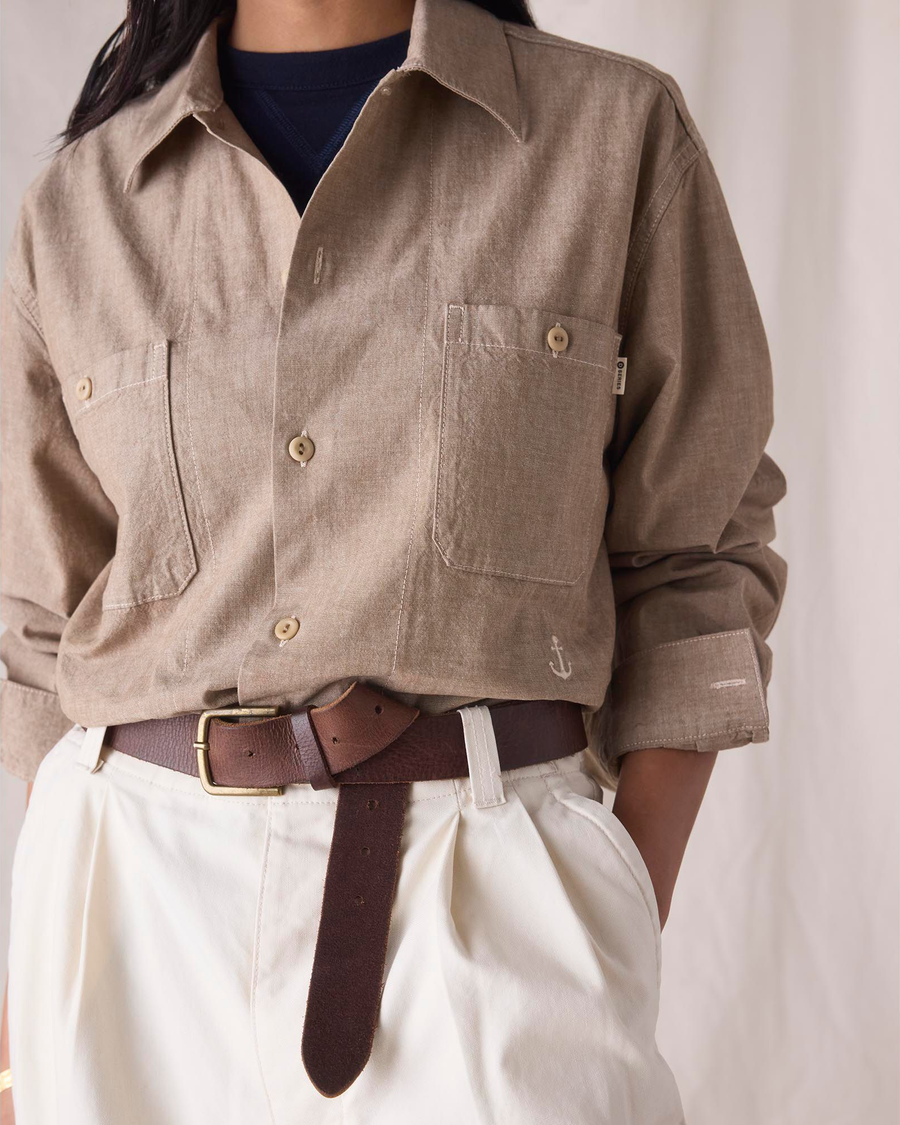 View of model wearing Khaki Chambray Dockers® x Transnomadica Dock Shirt.
