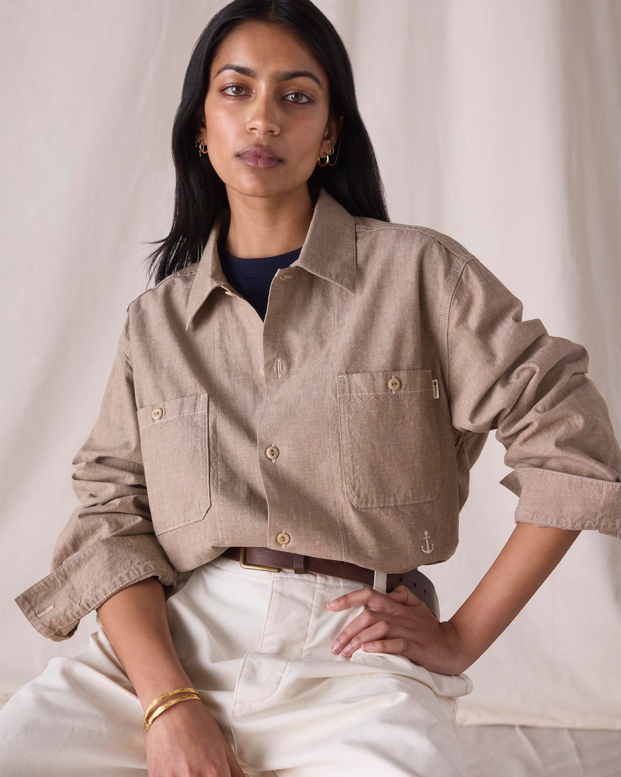 View of model wearing Khaki Chambray Dockers® x Transnomadica Dock Shirt.