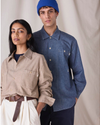 View of model wearing Khaki Chambray Dockers® x Transnomadica Dock Shirt.