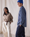 View of model wearing Khaki Chambray Dockers® x Transnomadica Dock Shirt.