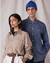 View of model wearing Khaki Chambray Dockers® x Transnomadica Dock Shirt.