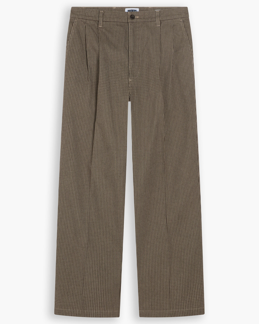 View of model wearing Lemon Pepper Eighty-Six Original Pleated Chinos, Loose Fit.