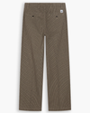 View of model wearing Lemon Pepper Eighty-Six Original Pleated Chinos, Loose Fit.