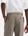 View of model wearing Lemon Pepper Eighty-Six Original Pleated Chinos, Loose Fit.