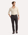 View of model wearing Licorice Crafted Khaki Pants, Slim Fit.