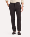 Front view of model wearing Licorice Crafted Khaki Pants, Slim Fit.