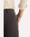 View of model wearing Licorice Crafted Khaki Pants, Slim Tapered Fit.