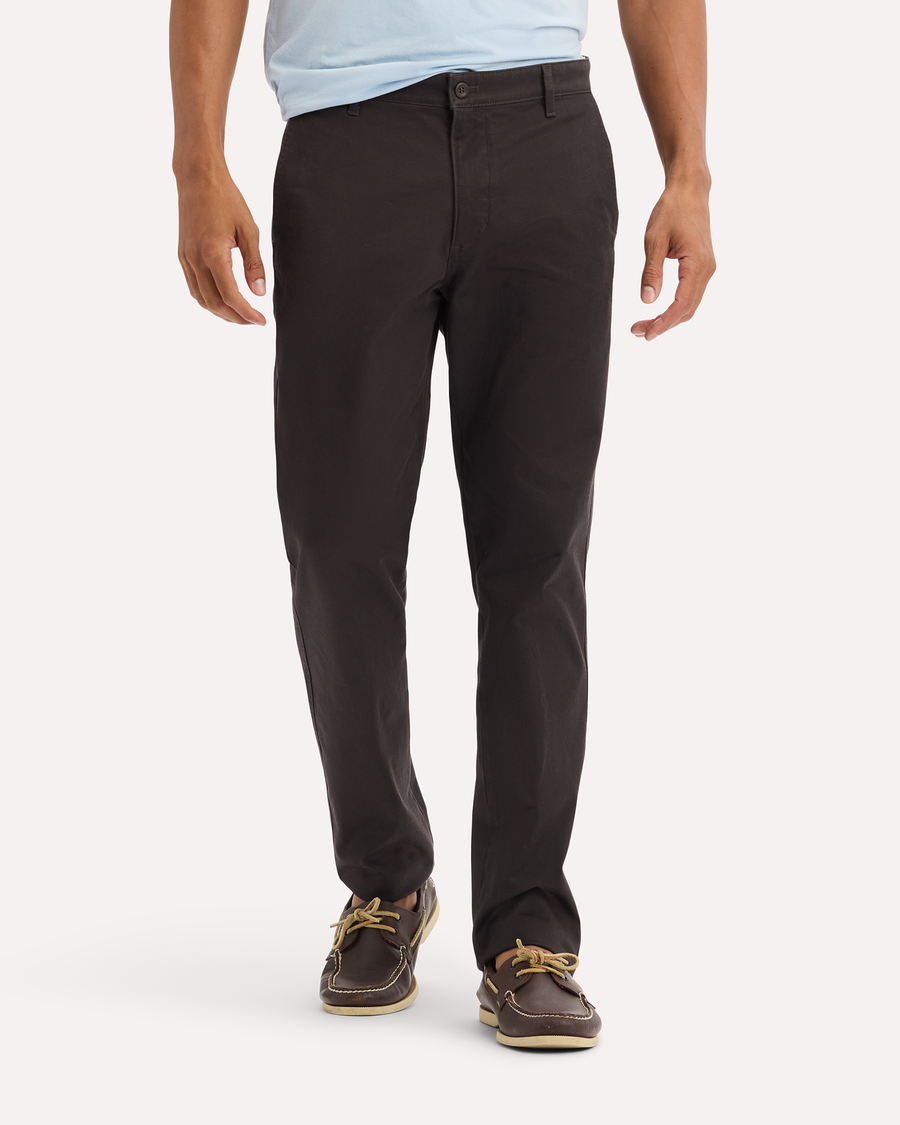 View of model wearing Licorice Original Chino Pants, Slim Fit.