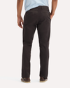 Back view of model wearing Licorice Original Chino Pants, Slim Fit.