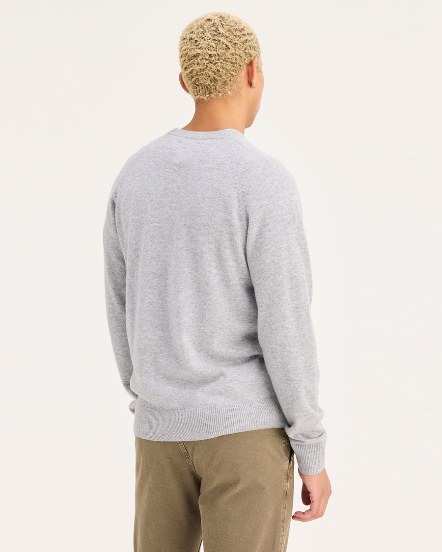 Back view of model wearing Light Heather Grey Men's Regular Fit Crafted Cashmere Sweater.