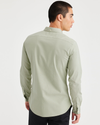 Back view of model wearing Lint Dyed Men's Slim Fit 2 Button Collar Shirt.