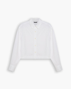 View of model wearing Lucent White Boxy Cropped Shirt, Relaxed Fit.
