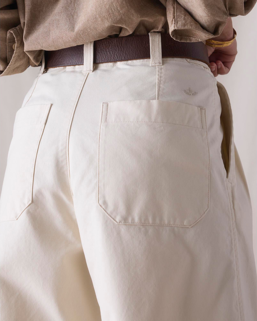View of model wearing Lucent White Dockers® x Transnomadica Rigger Pant.