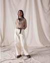 View of model wearing Lucent White Dockers® x Transnomadica Rigger Pant.