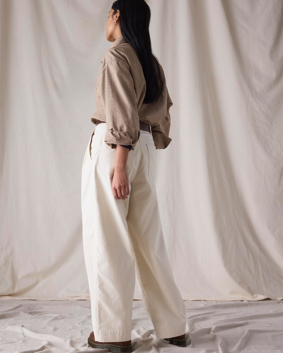 Back view of model wearing Lucent White Dockers® x Transnomadica Rigger Pant.