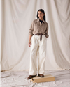 Front view of model wearing Lucent White Dockers® x Transnomadica Rigger Pant.