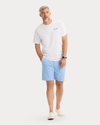 View of model wearing Lucent White Graphic Tee, Regular Fit.