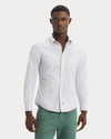 Front view of model wearing Lucent White Ultimate Shirt, Slim Fit.
