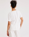 Back view of model wearing Lucent White Women's Deep V-Neck Tee Shirt.