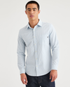 Front view of model wearing Lunar Cashmere Blue Men's Slim Fit Icon Button Up Shirt.