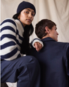 View of model wearing Mariner Navy Dockers® x Transnomadica Mariner Sweater.