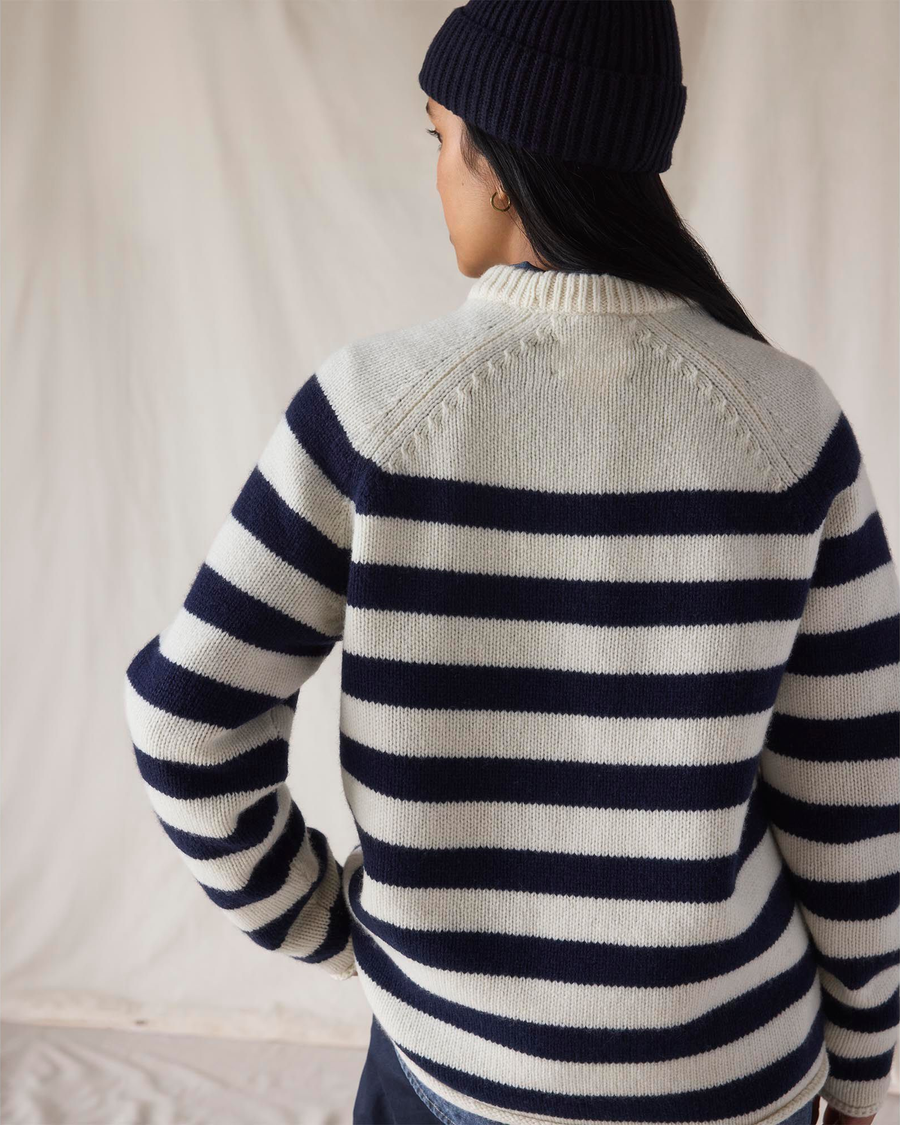 Back view of model wearing Mariner Navy Dockers® x Transnomadica Mariner Sweater.
