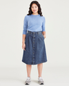 Front view of model wearing Medium Indigo Stonewash Women's Midi Skirt.