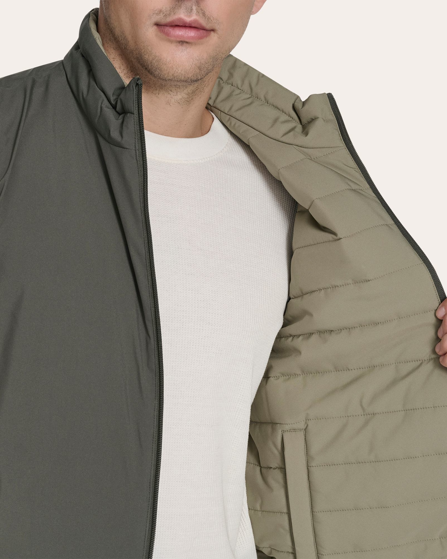 View of model wearing Mermaid Reversible Puffer Vest.