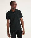 Front view of model wearing Mineral Black Pique Polo, Slim Fit.