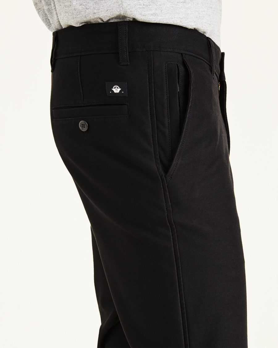 View of model wearing Mineral Black Smart 360 Flex Comfort Knit Chino Pants, Slim Fit.