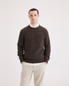 Front view of model wearing Molasses Men's Regular Fit Crewneck Sweater.