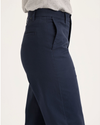 Side view of model wearing Navy Blazer Blake Chino Pants, High Straight Fit.