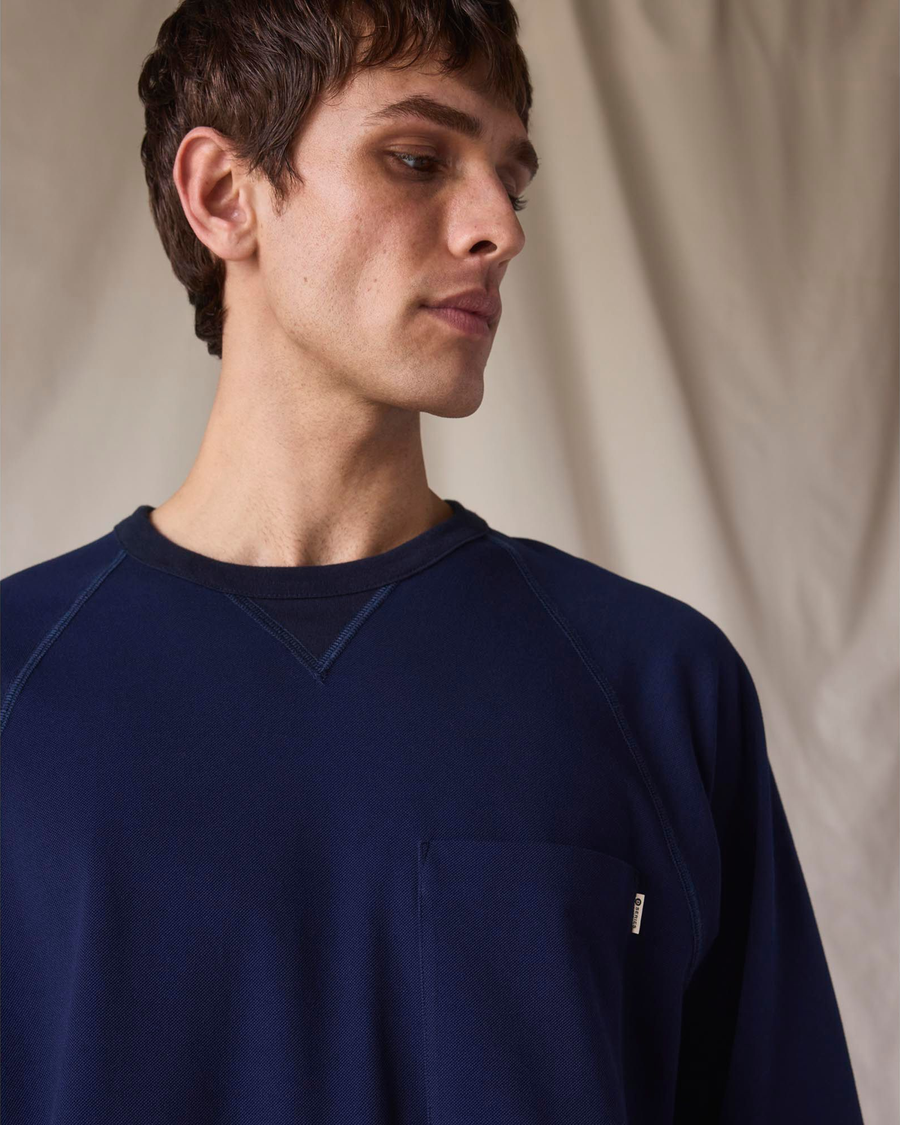 View of model wearing Navy Blazer Dockers® x Transnomadica Pique Popover.