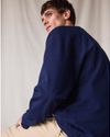 Back view of model wearing Navy Blazer Dockers® x Transnomadica Pique Popover.