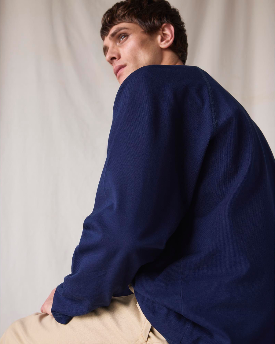 Back view of model wearing Navy Blazer Dockers® x Transnomadica Pique Popover.