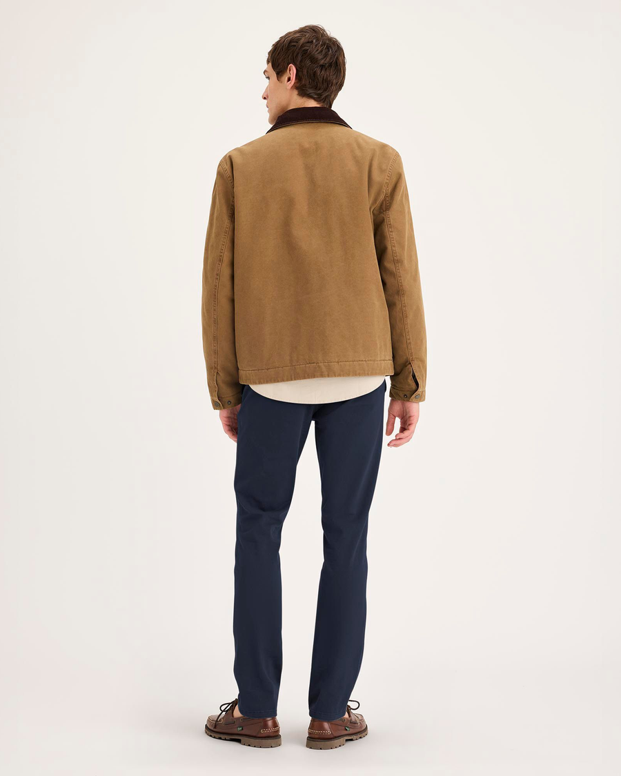 Back view of model wearing Navy Blazer Essential Chino Pants, Skinny Fit.