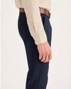 Side view of model wearing Navy Blazer Essential Chino Pants, Skinny Fit.