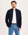 Front view of model wearing Navy Blazer Full-Zip Sweater, Regular Fit.