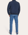Back view of model wearing Navy Blazer Go Golf Bomber.