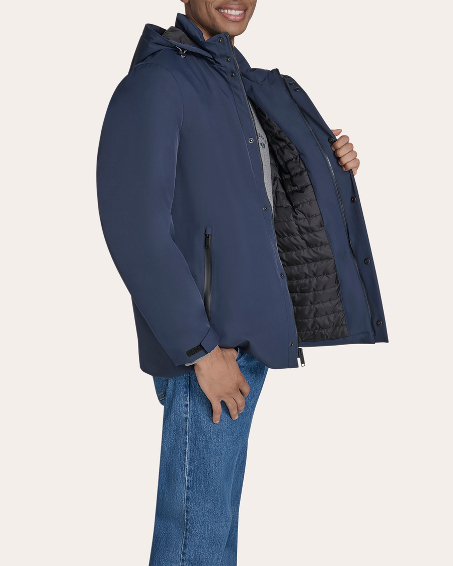 View of model wearing Navy Blazer Go Rain Commuter Jacket.