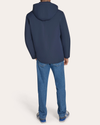 Back view of model wearing Navy Blazer Go Rain Commuter Jacket.