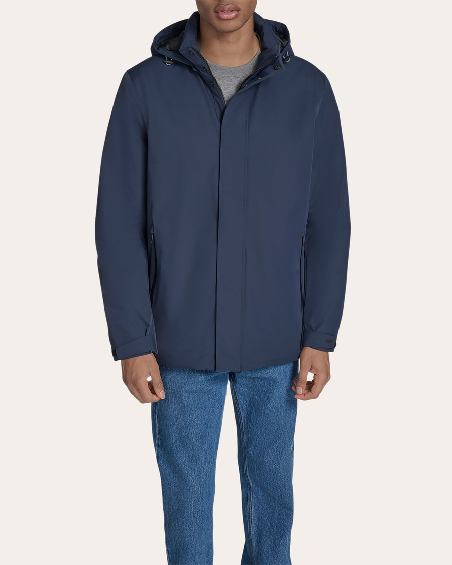 Front view of model wearing Navy Blazer Go Rain Commuter Jacket.