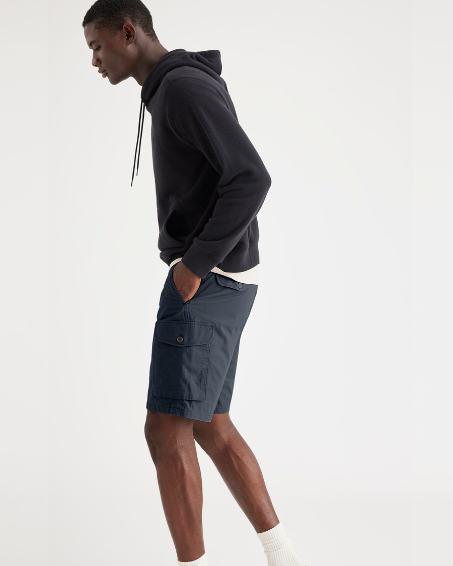 View of model wearing Navy Blazer Men's Cargo Shorts.