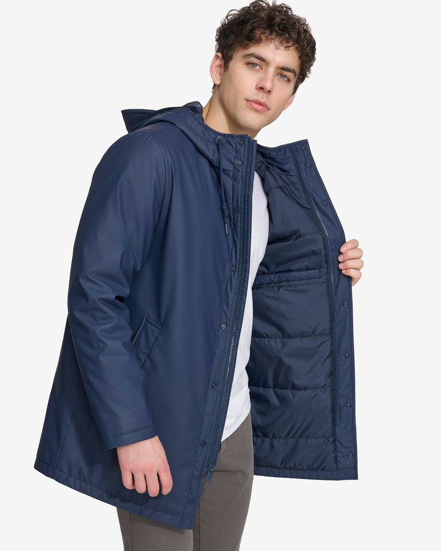 View of model wearing Navy Blazer Men's Lightweight Rain Jacket.