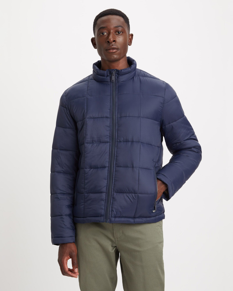 Front view of model wearing Navy Blazer Men's Nylon Lightweight Quilted Jacket.
