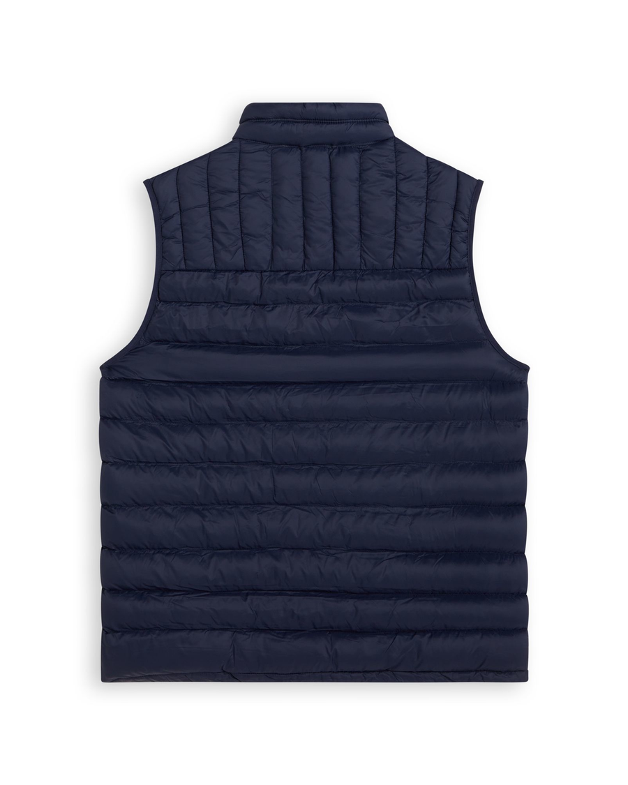 View of model wearing Navy Blazer Men's Packable Vest.