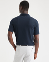 Back view of model wearing Navy Blazer Men's Slim Fit Original Polo Shirt.